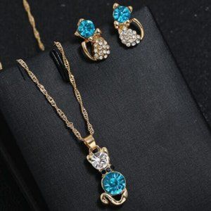 Adorable Topaz Blue Crystal Rhinestone Sparkly Gold Necklace Pierced Earring Set